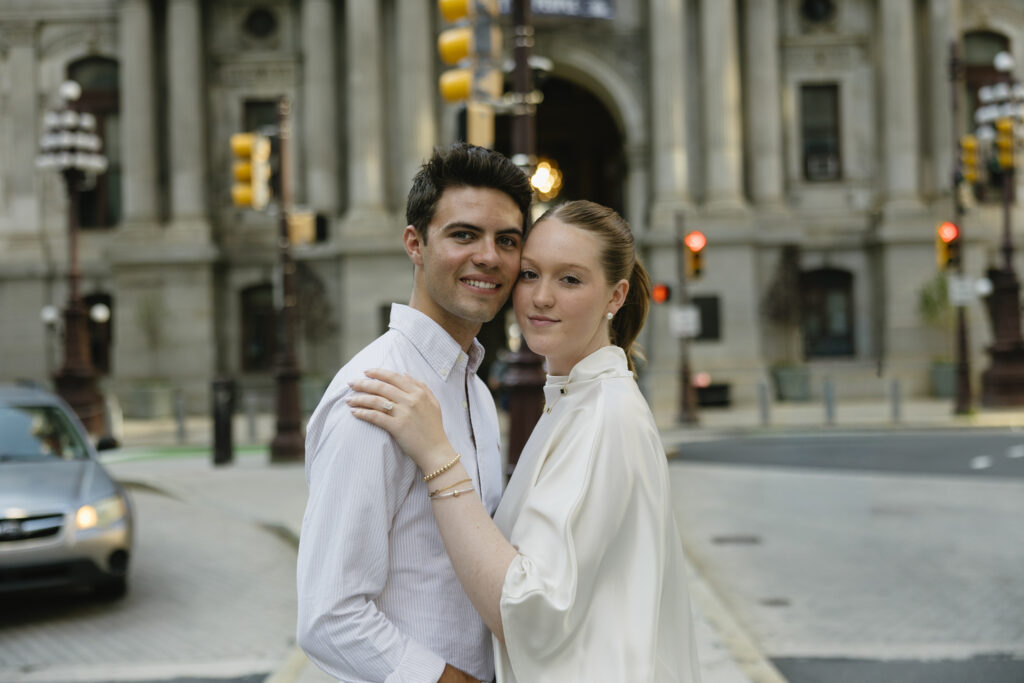 Bride-and-groom-sharing-a-romantic-portrait-outside-Philadelphia-City-Hall-on-their-wedding-day
