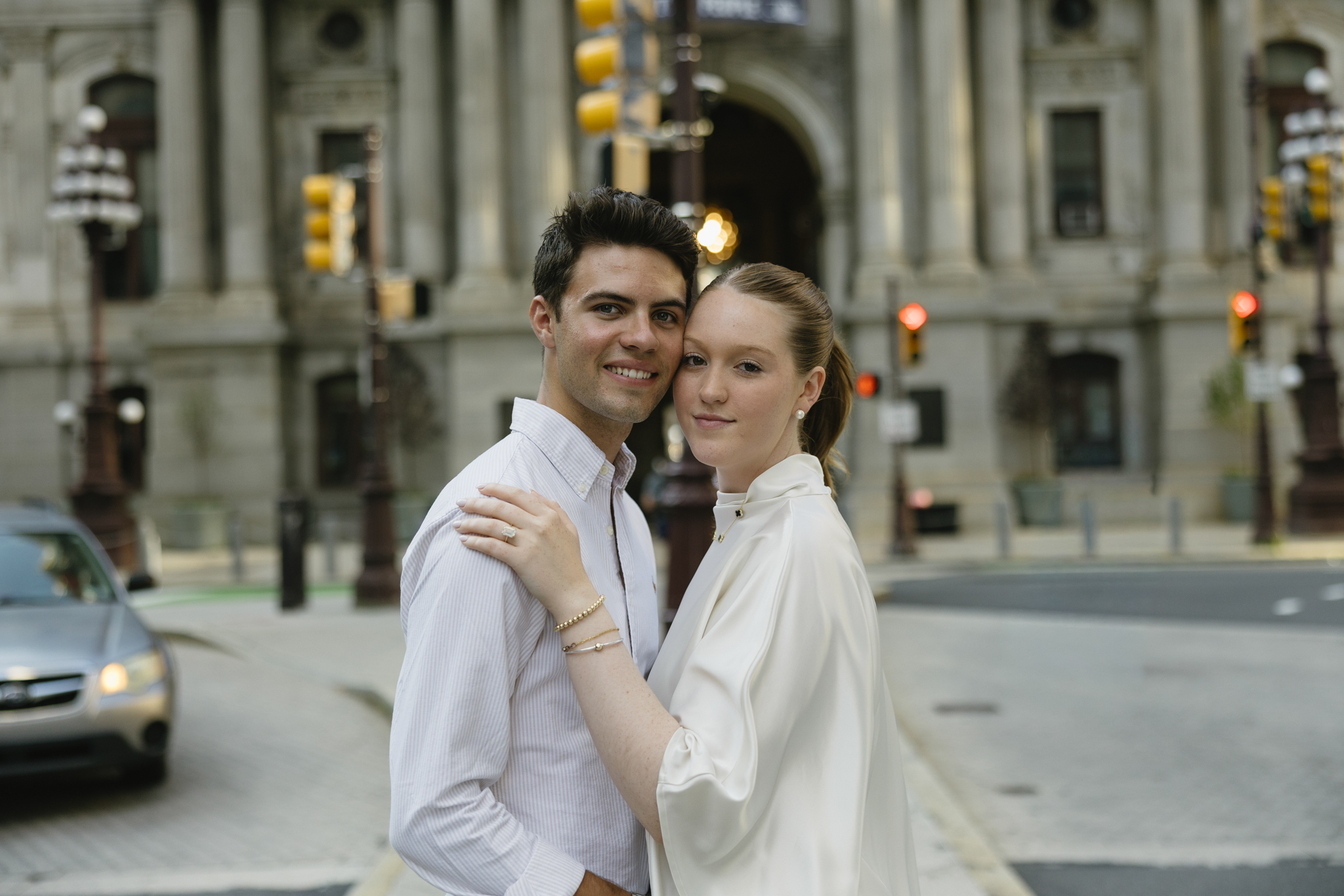 Bride-and-groom-sharing-a-romantic-portrait-outside-Philadelphia-City-Hall-on-their-wedding-day