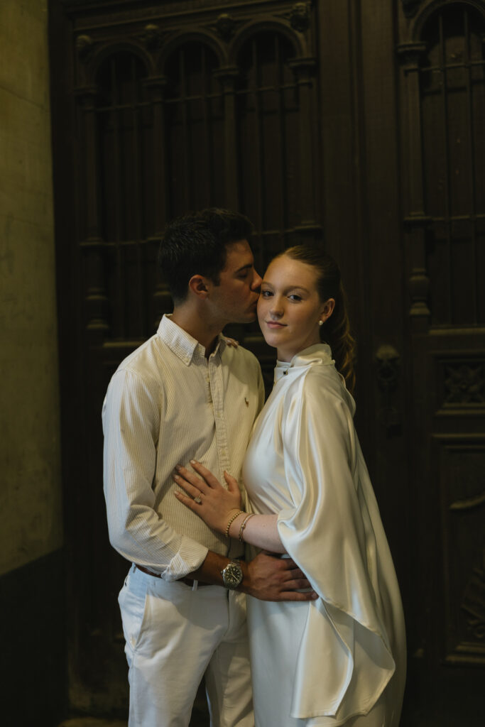 Bride-and-groom-sharing-a-romantic-portrait-outside-Philadelphia-City-Hall-on-their-wedding-day