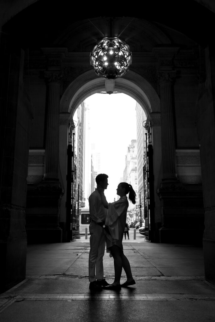 Bride-and-groom-sharing-a-romantic-portrait-outside-Philadelphia-City-Hall-on-their-wedding-day