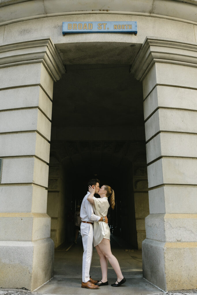 Bride-and-groom-sharing-a-romantic-portrait-outside-Philadelphia-City-Hall-on-their-wedding-day