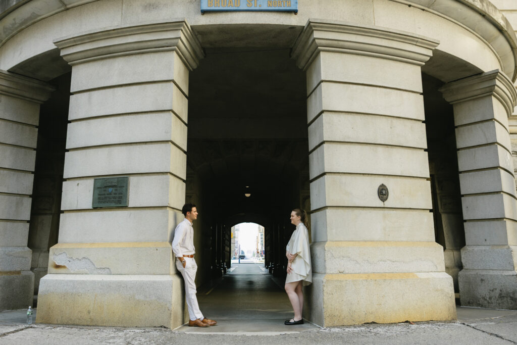 Bride-and-groom-sharing-a-romantic-portrait-outside-Philadelphia-City-Hall-on-their-wedding-day